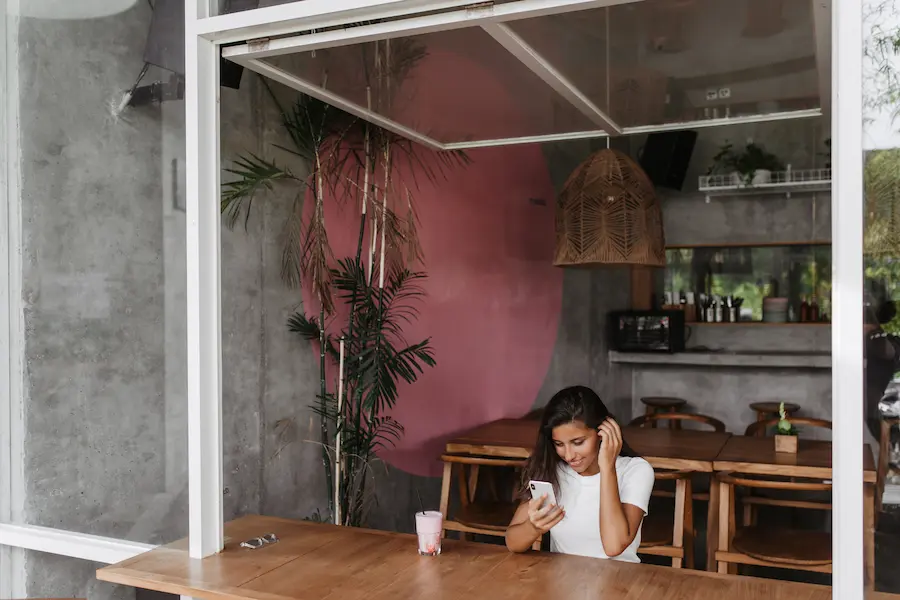 a lady sitting at a Quiet Corner of a cafe